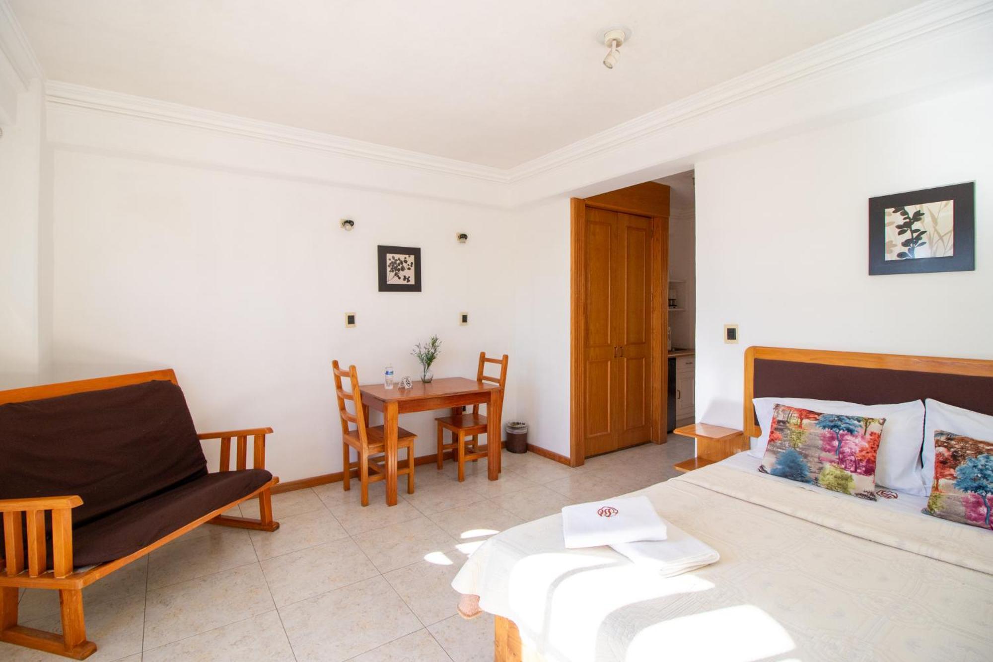 Suites Sevilla ปวยบลา ภายนอก รูปภาพ