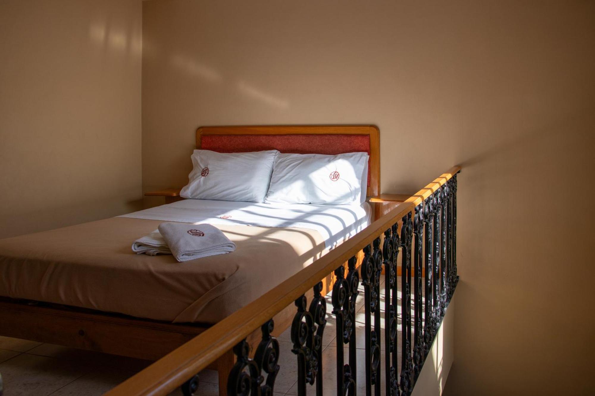 Suites Sevilla ปวยบลา ภายนอก รูปภาพ