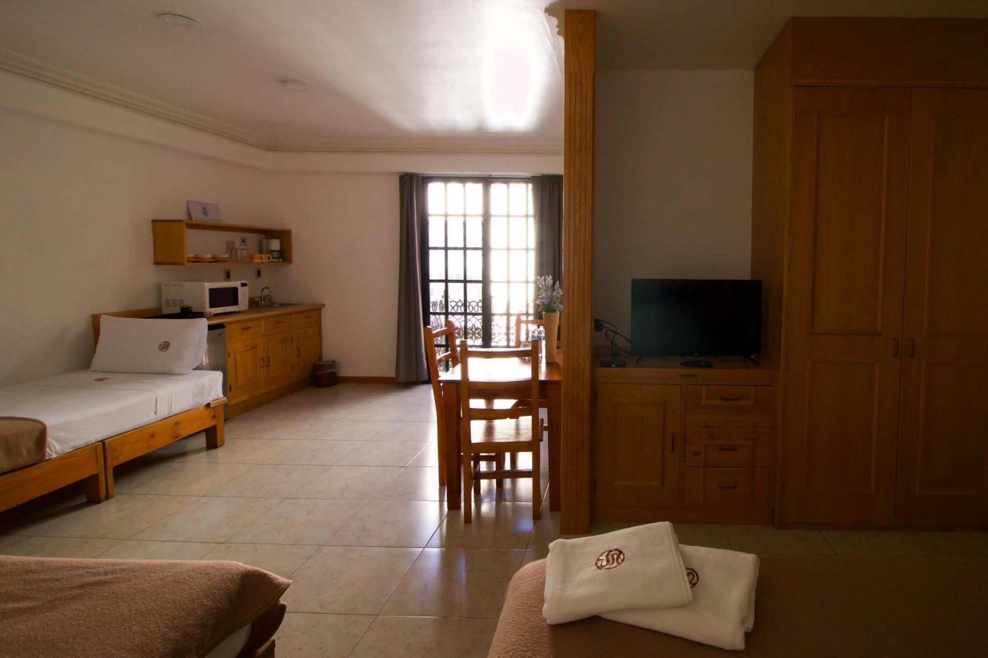 Suites Sevilla ปวยบลา ภายนอก รูปภาพ