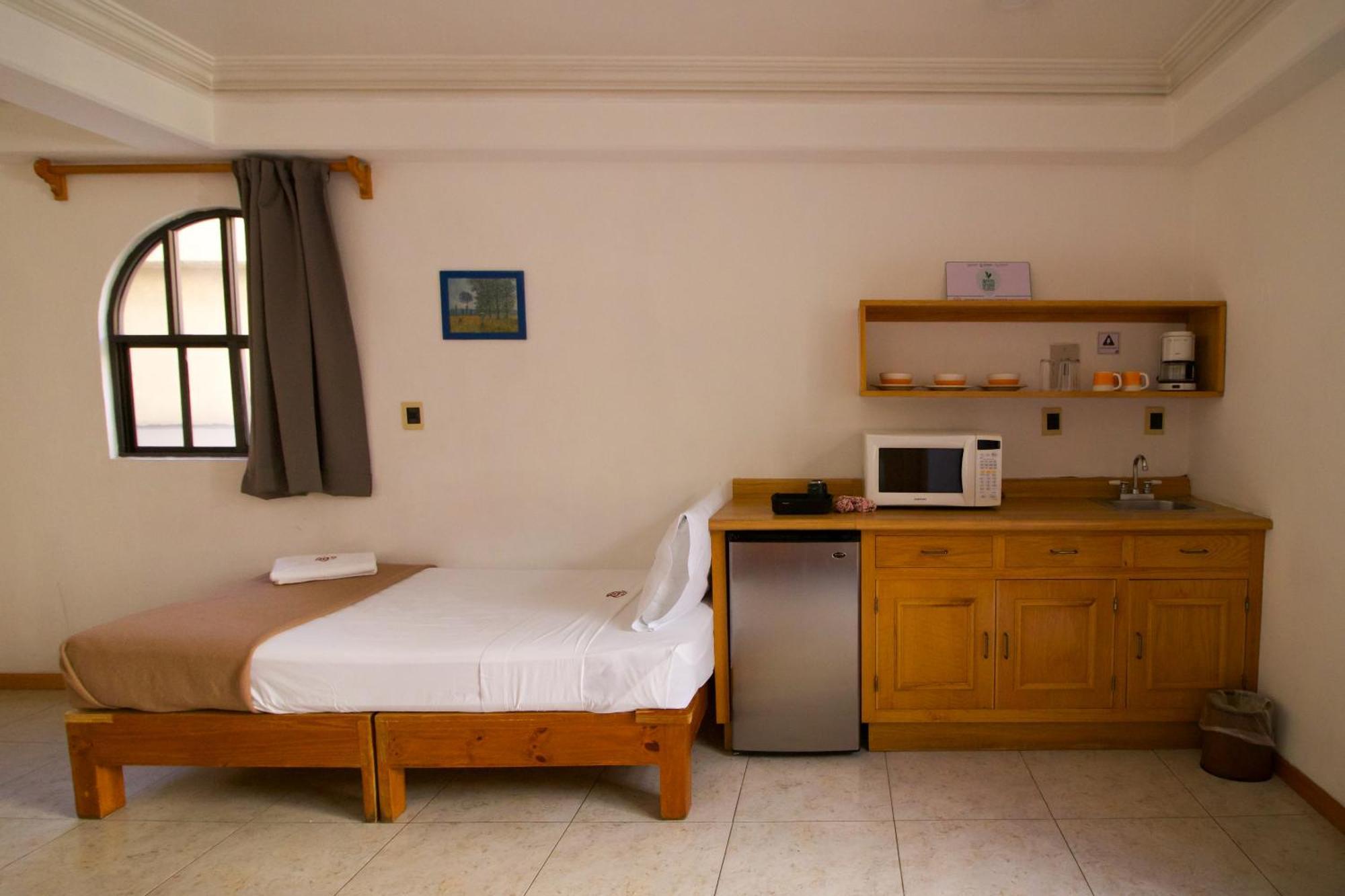 Suites Sevilla ปวยบลา ภายนอก รูปภาพ