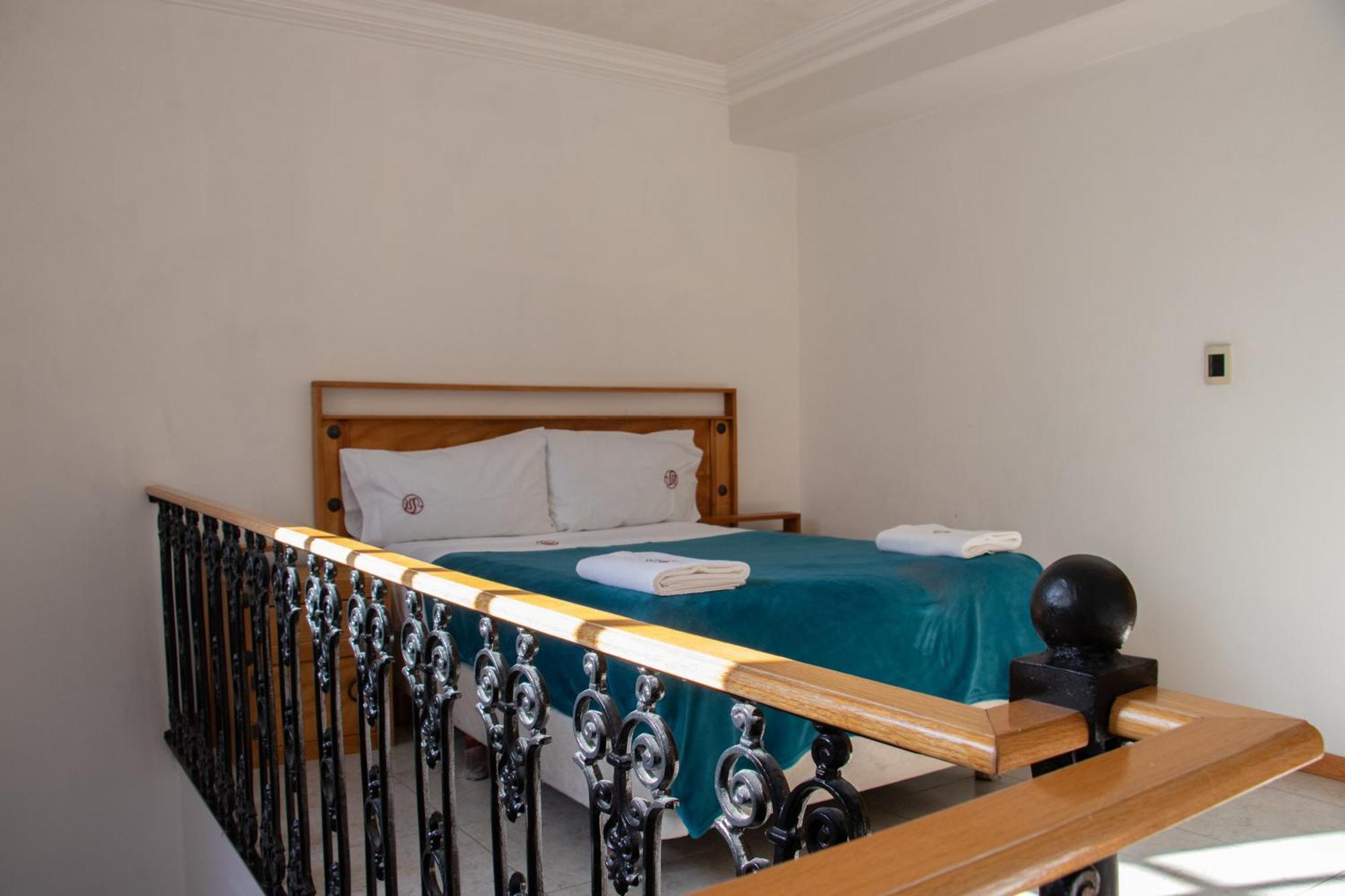 Suites Sevilla ปวยบลา ภายนอก รูปภาพ