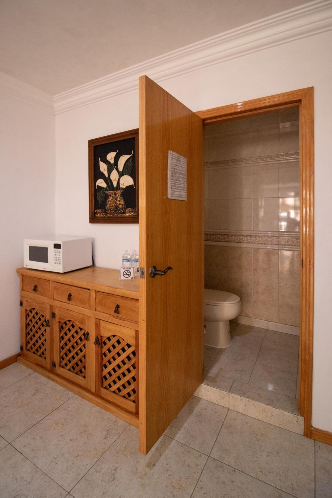 Suites Sevilla ปวยบลา ภายนอก รูปภาพ