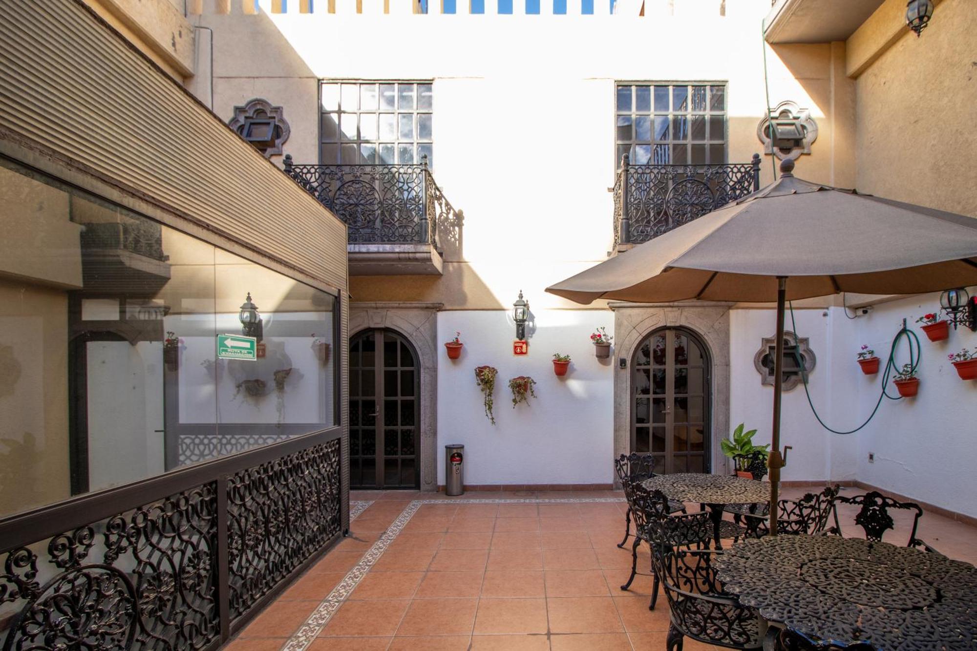 Suites Sevilla ปวยบลา ภายนอก รูปภาพ