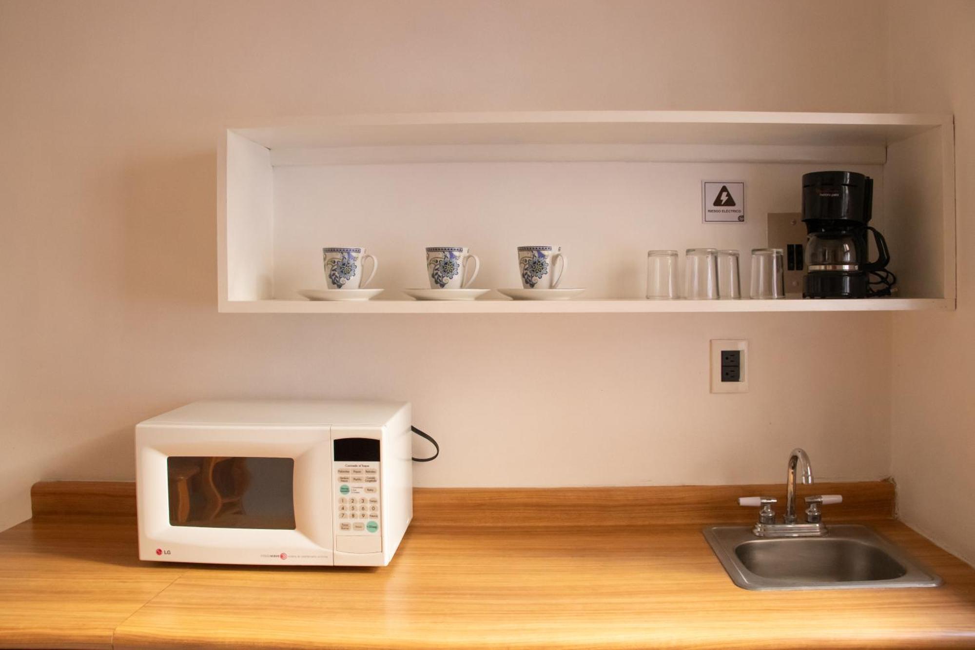 Suites Sevilla ปวยบลา ภายนอก รูปภาพ