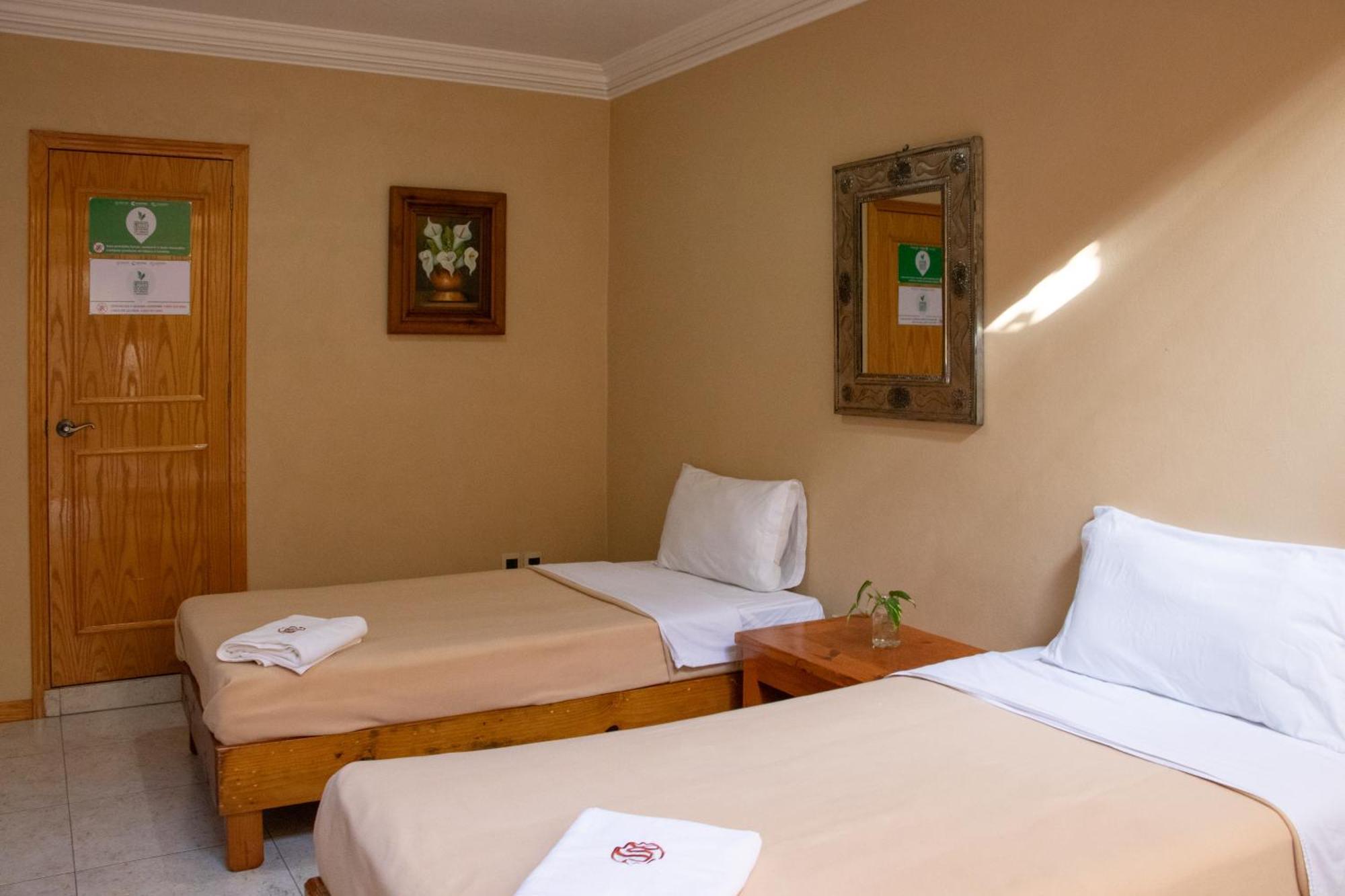 Suites Sevilla ปวยบลา ภายนอก รูปภาพ