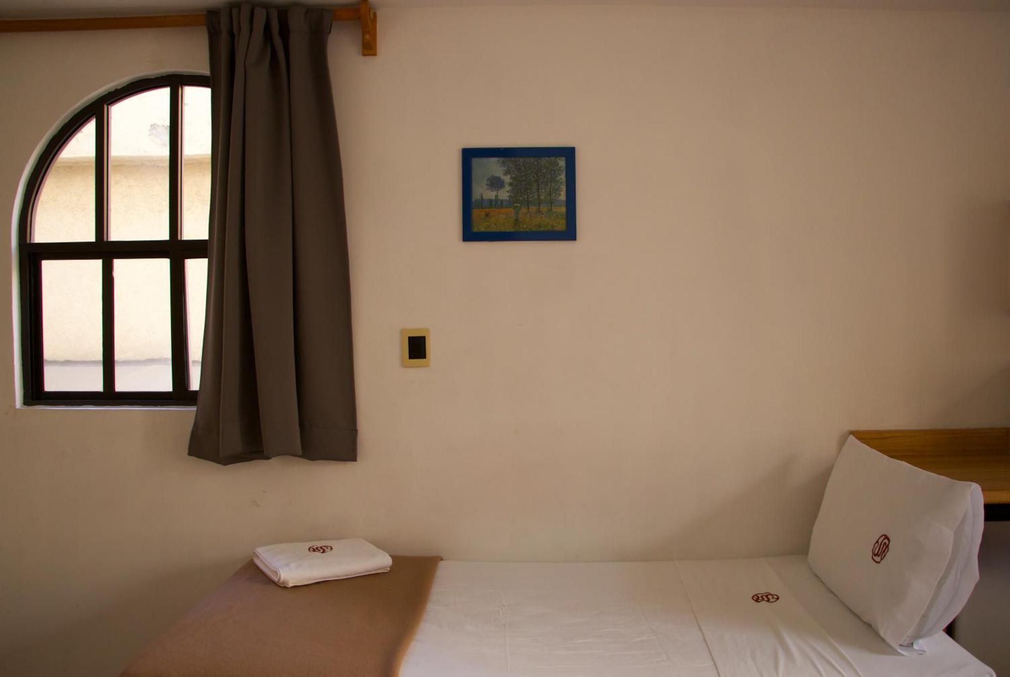 Suites Sevilla ปวยบลา ภายนอก รูปภาพ