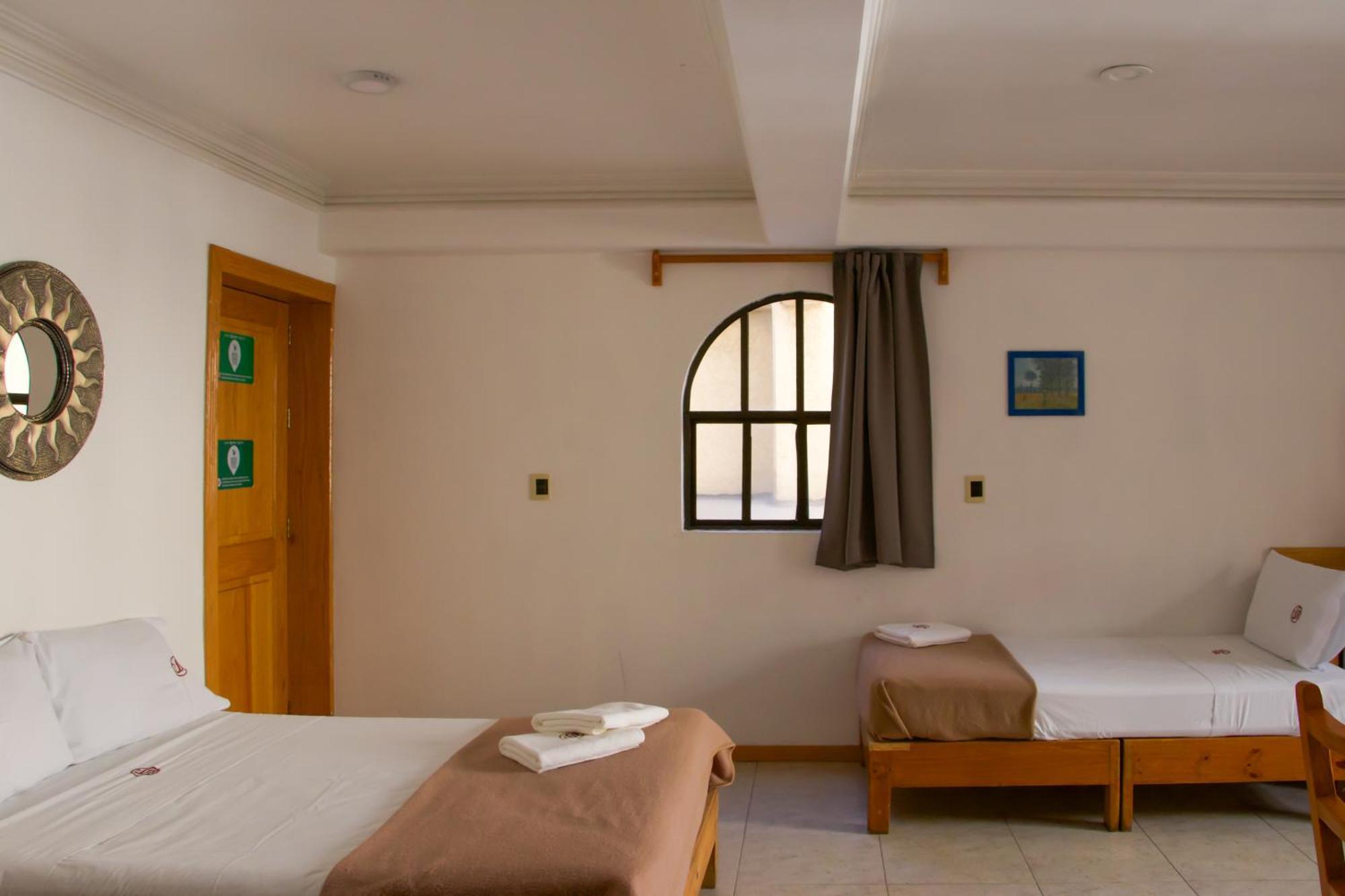 Suites Sevilla ปวยบลา ภายนอก รูปภาพ