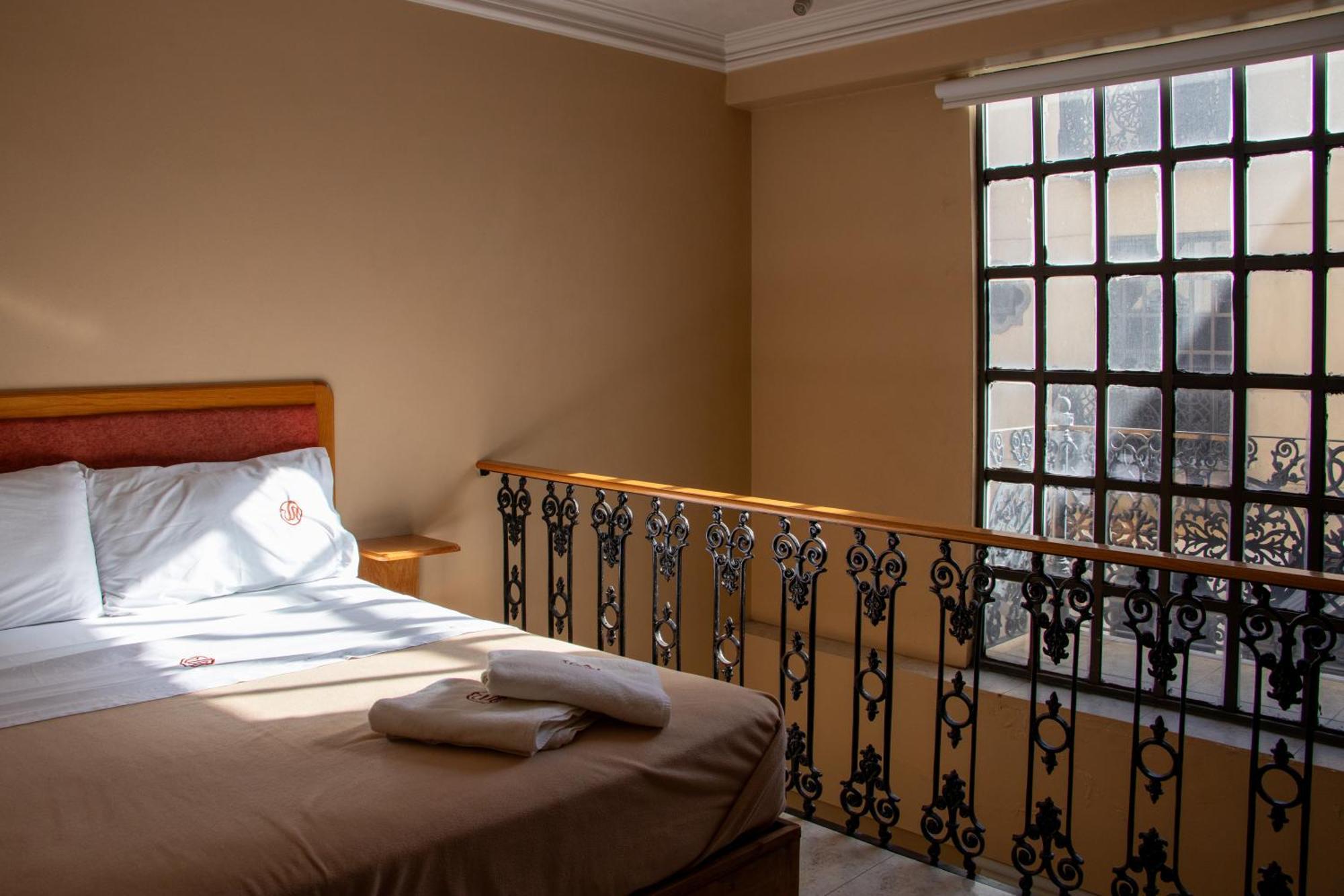 Suites Sevilla ปวยบลา ภายนอก รูปภาพ