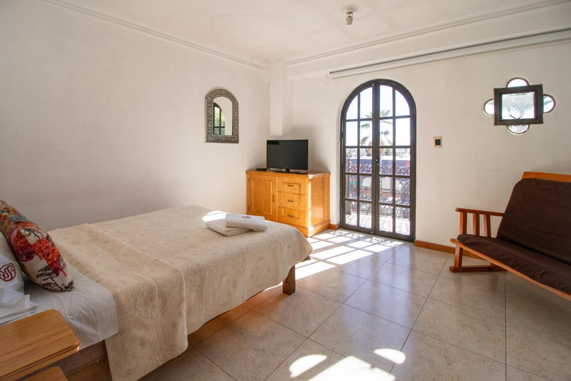 Suites Sevilla ปวยบลา ภายนอก รูปภาพ